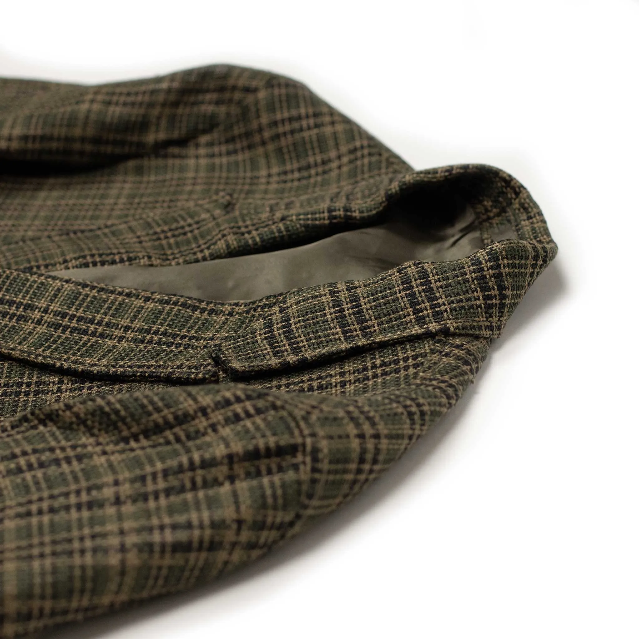 Double-breasted relaxed jacket in dark olive plaid open-weave linen