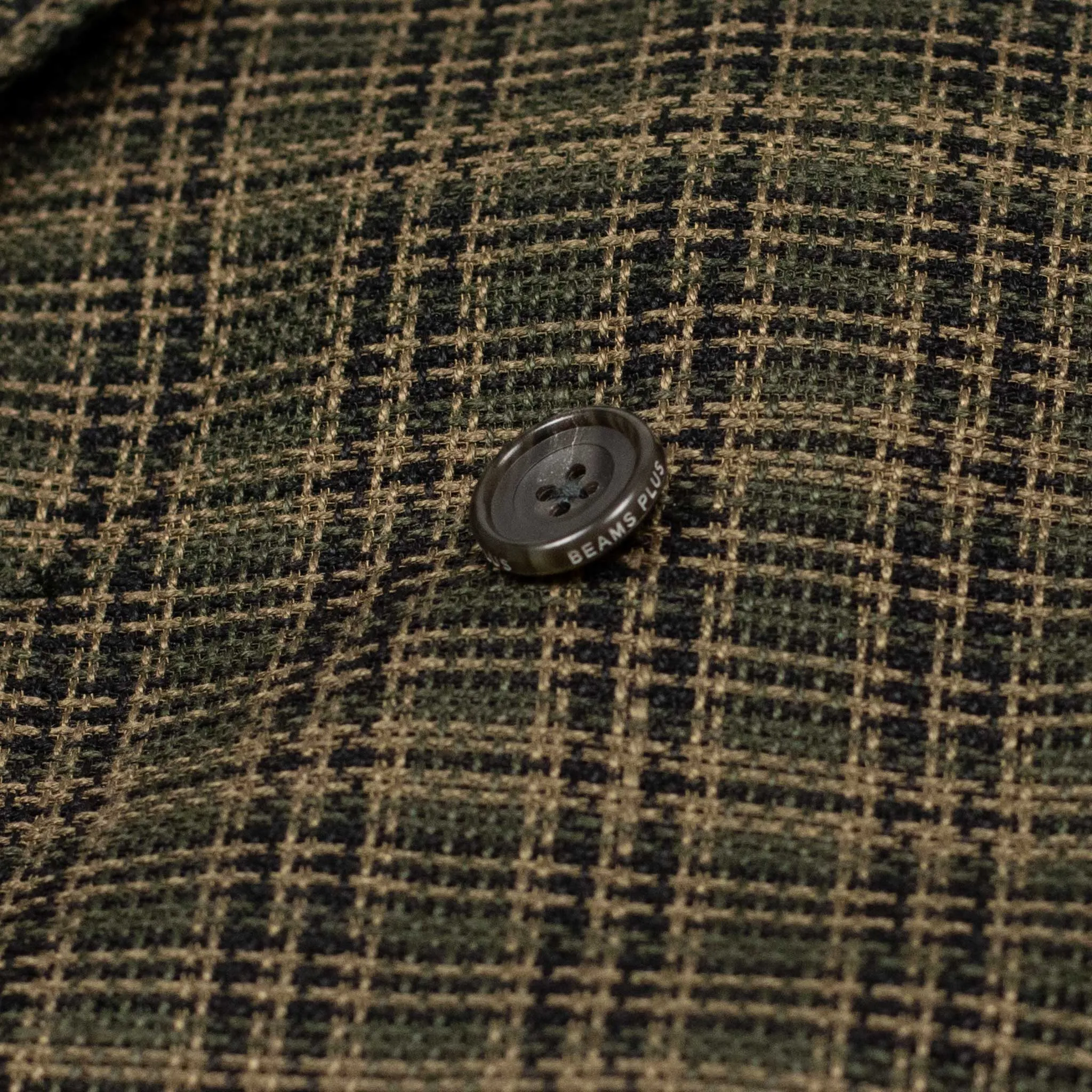 Double-breasted relaxed jacket in dark olive plaid open-weave linen