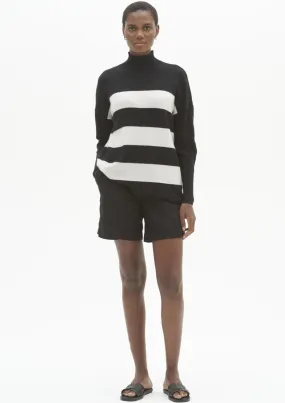 Lofty Relaxed Turtleneck Sweater in Black Sparkle Stripe