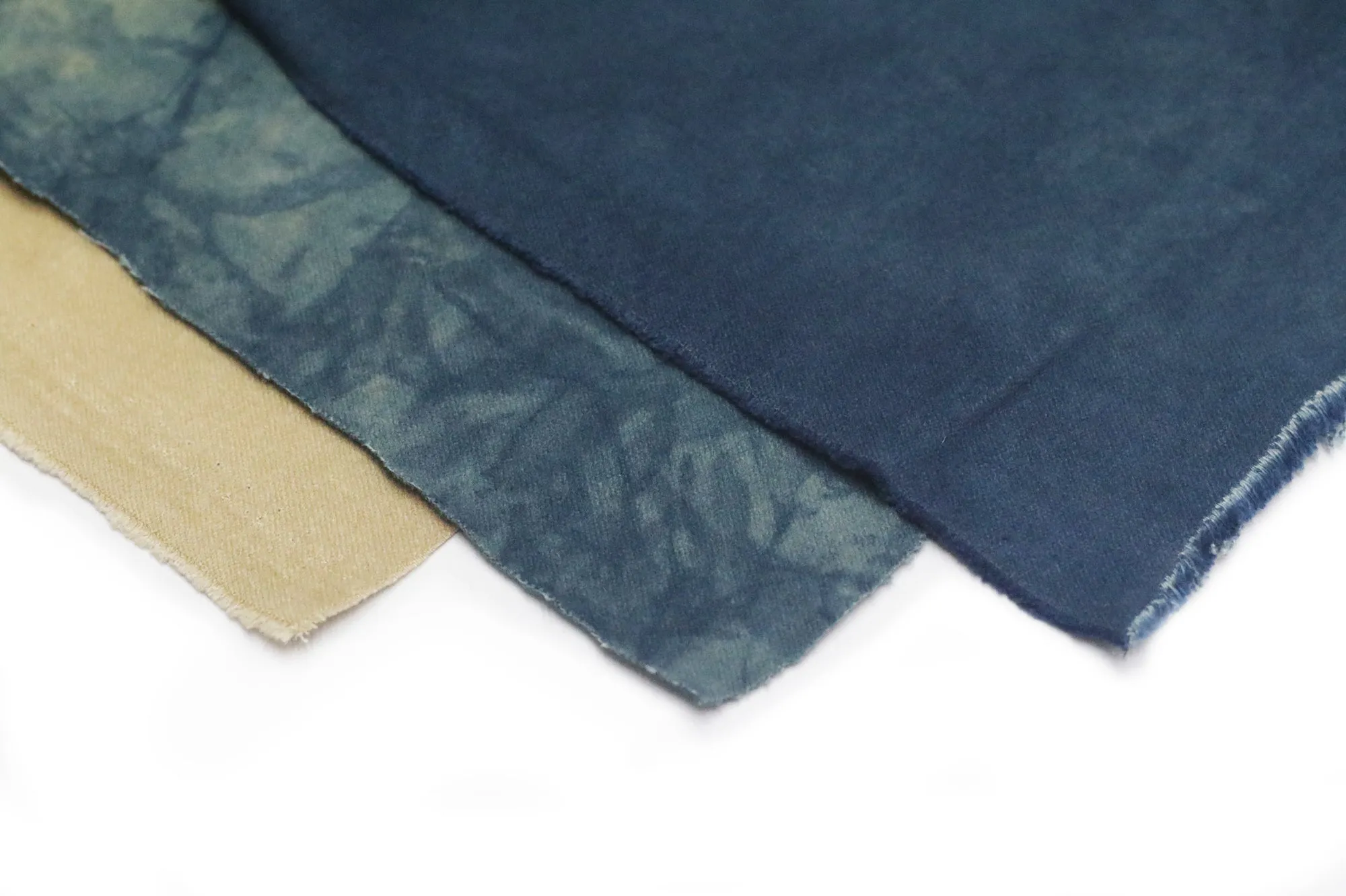 NATURAL INDIGO DYED SUEDE.