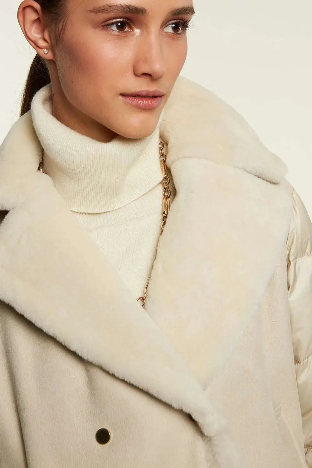 Shearling jacket with down inserts