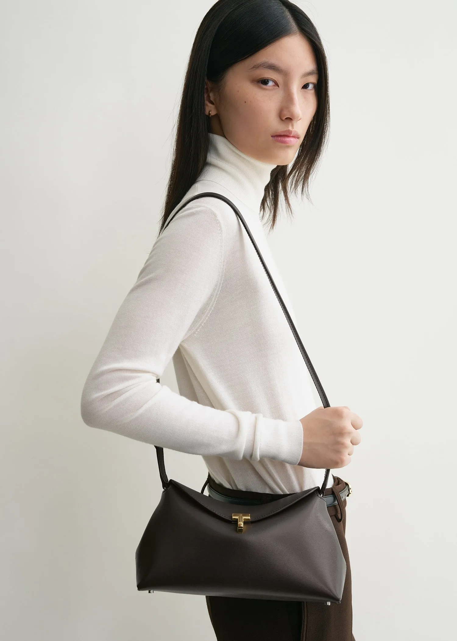 T-Lock leather clutch bark